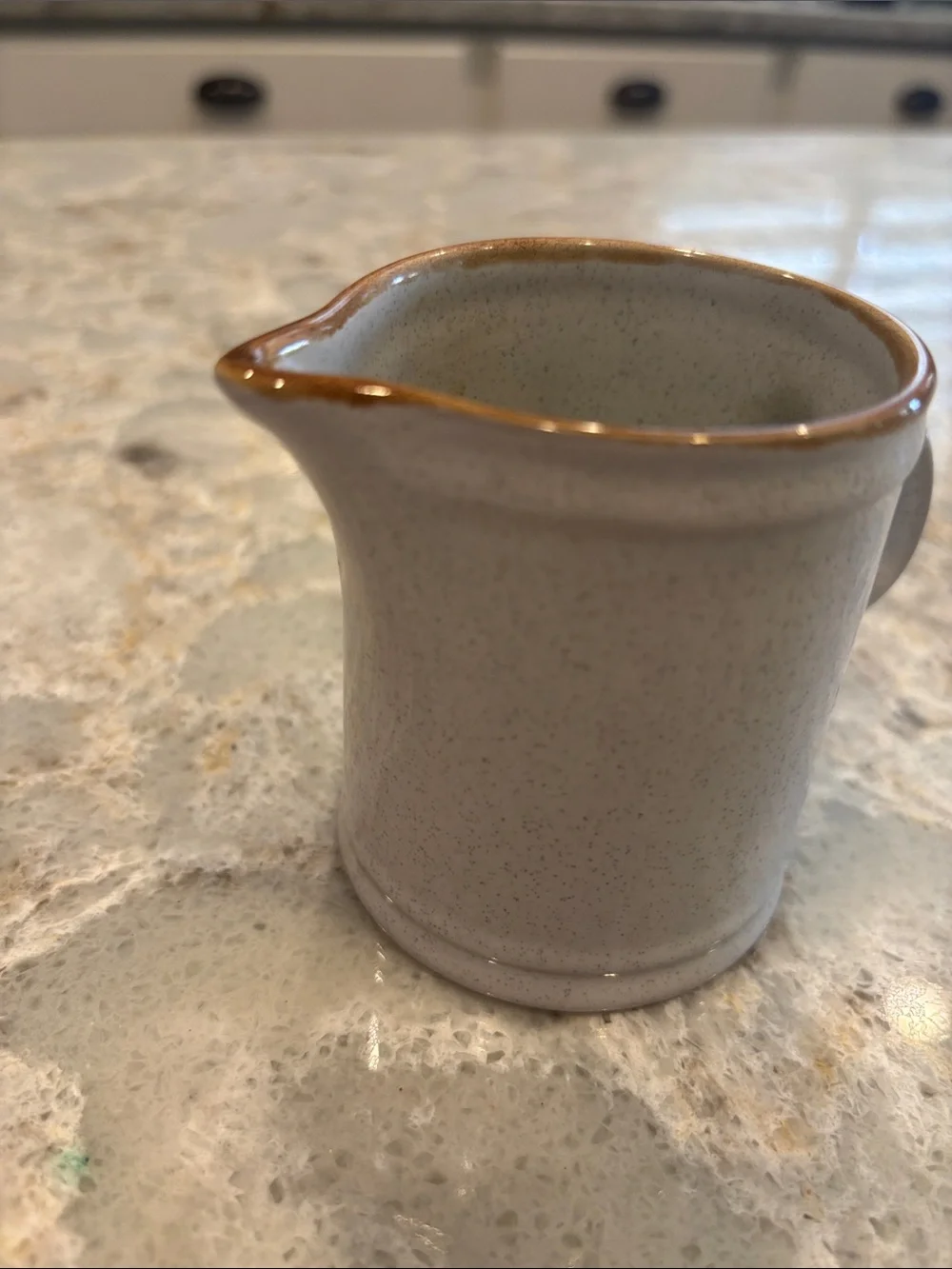 Vintage Stoneware Nikko Stone Creamer in Speckeled off white. No chips/cracks